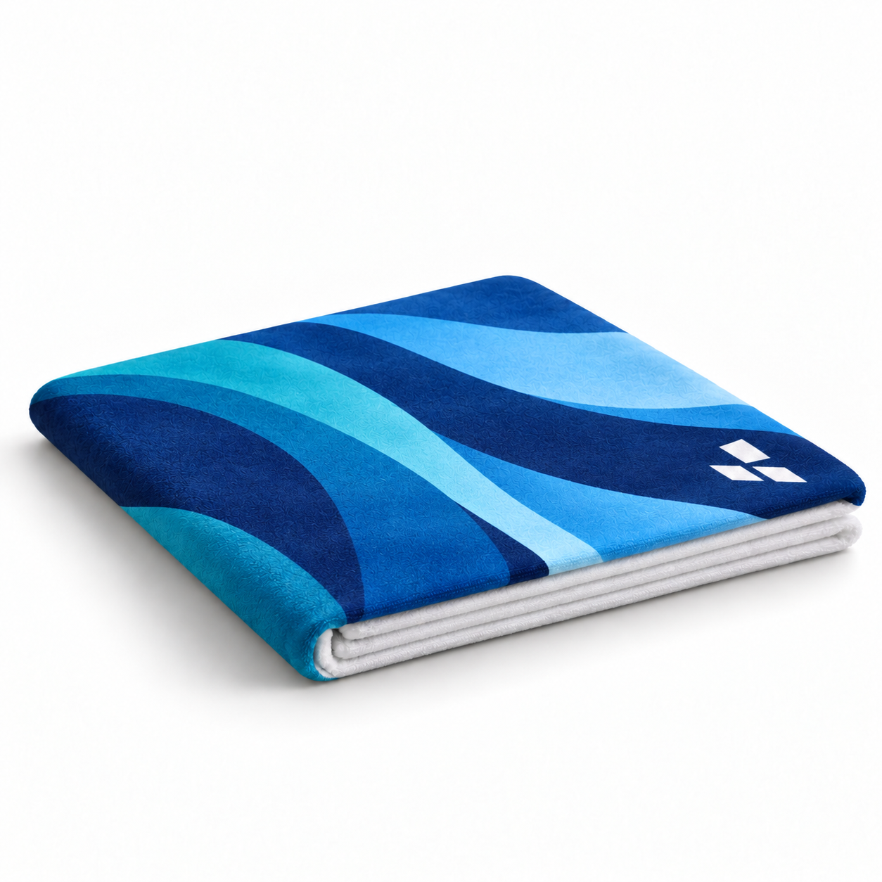 Representative towel with a navy and teal sublimated design, showing flatter fibres immediately after heat pressing.